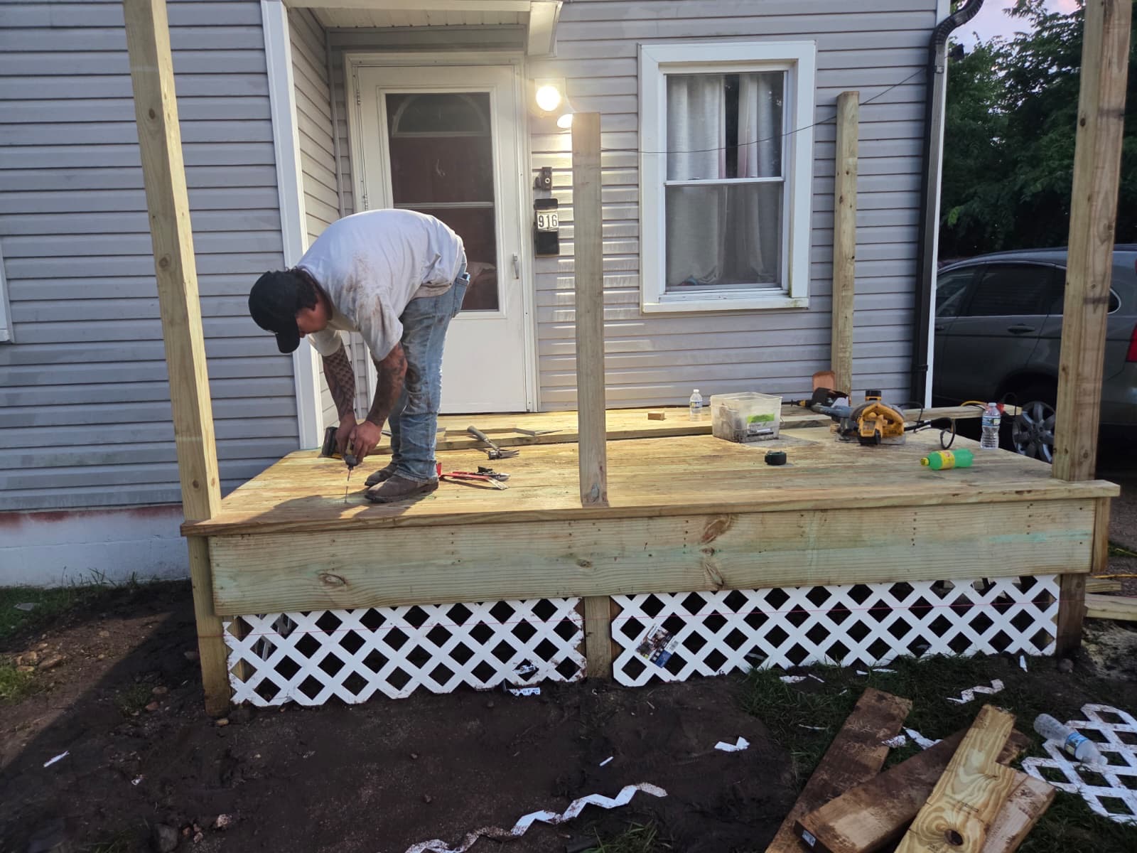 Custom pressure-treated deck build in progress