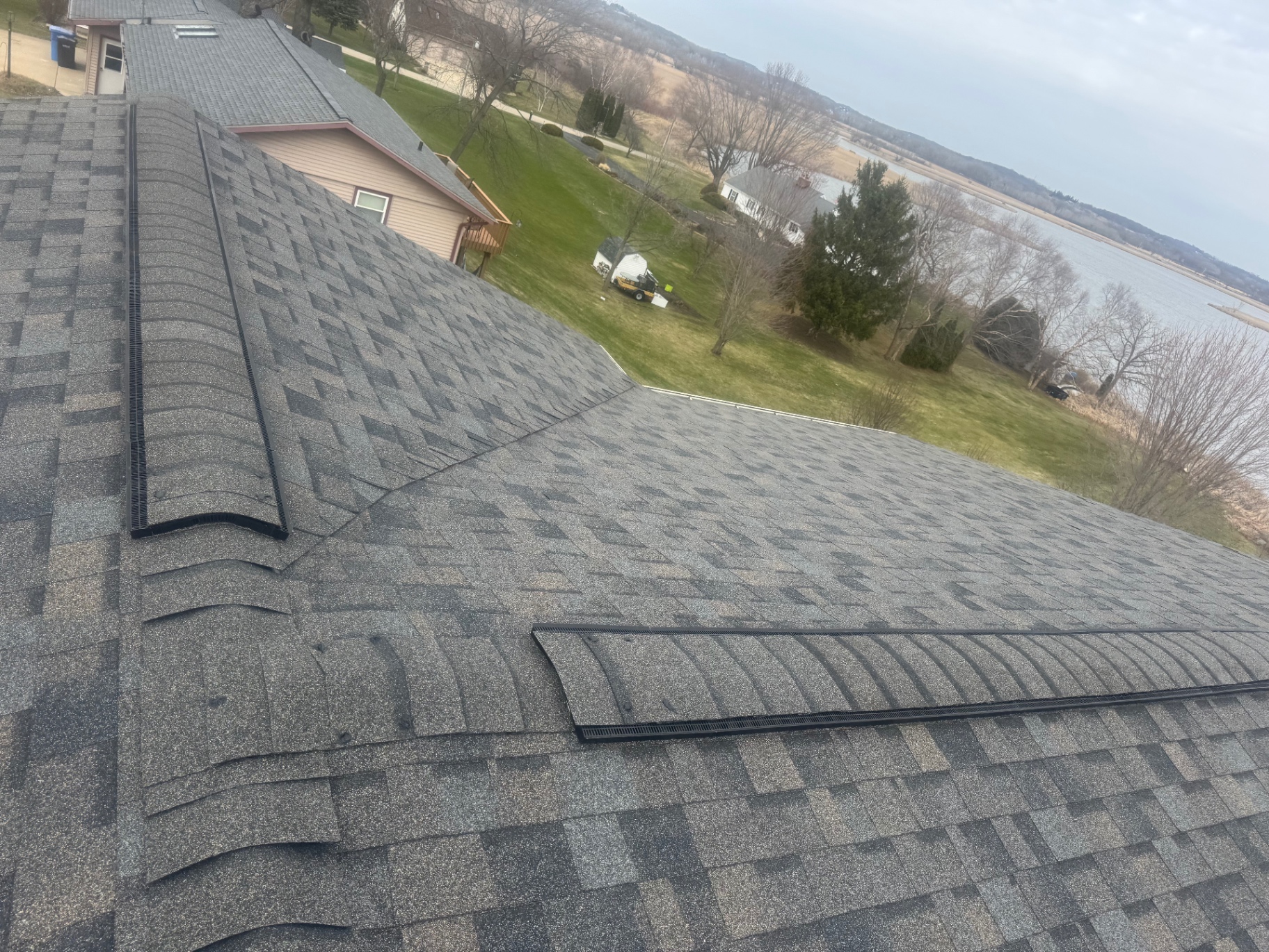 Complex hip roof with premium designer shingles